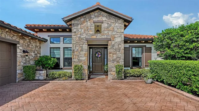 a view of living room with furniture and a window