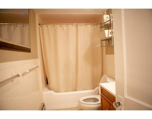 130 Middleton Road Boxford, MA 01921 - Photo 17 of 19 a bathroom with a toilet and a shower curtain