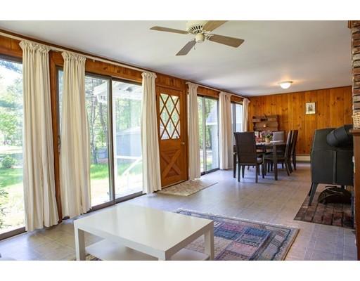 130 Middleton Road Boxford, MA 01921 - Photo 9 of 19 a view of a livingroom with furniture wooden floor and windows