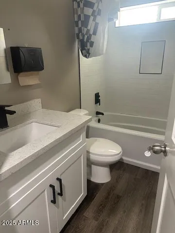 a bedroom with a bed and a table