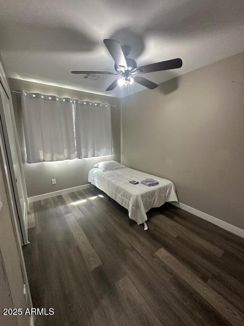 1908 South 14th Street Phoenix, AZ 85034 - Photo 15 of 18 a living room with furniture and a ceiling fan