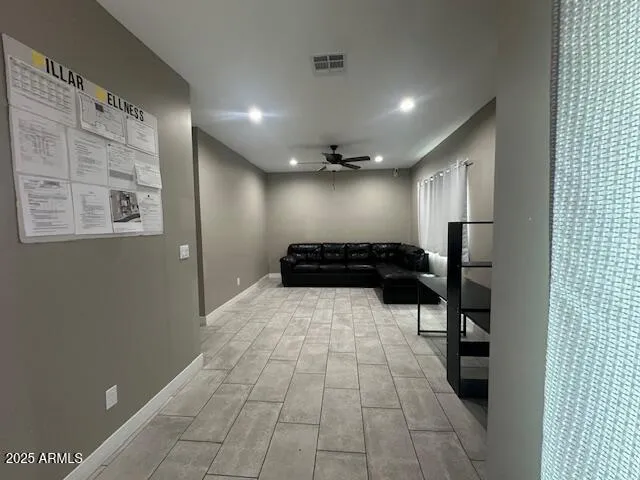 a bathroom with a sink a toilet and a shower