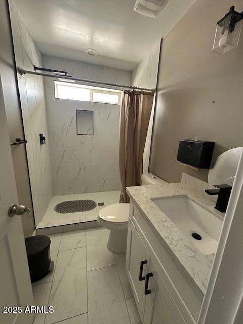 1908 South 14th Street Phoenix, AZ 85034 - Photo 10 of 18 a bathroom with a sink a toilet and a shower