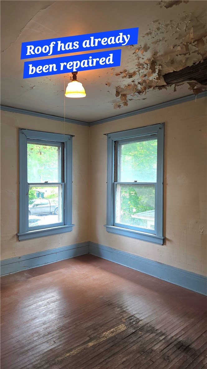 302 Field Street Rochester, NY 14620 - Photo 18 of 32 2nd Bedroom. Damage was from a roof leak that has