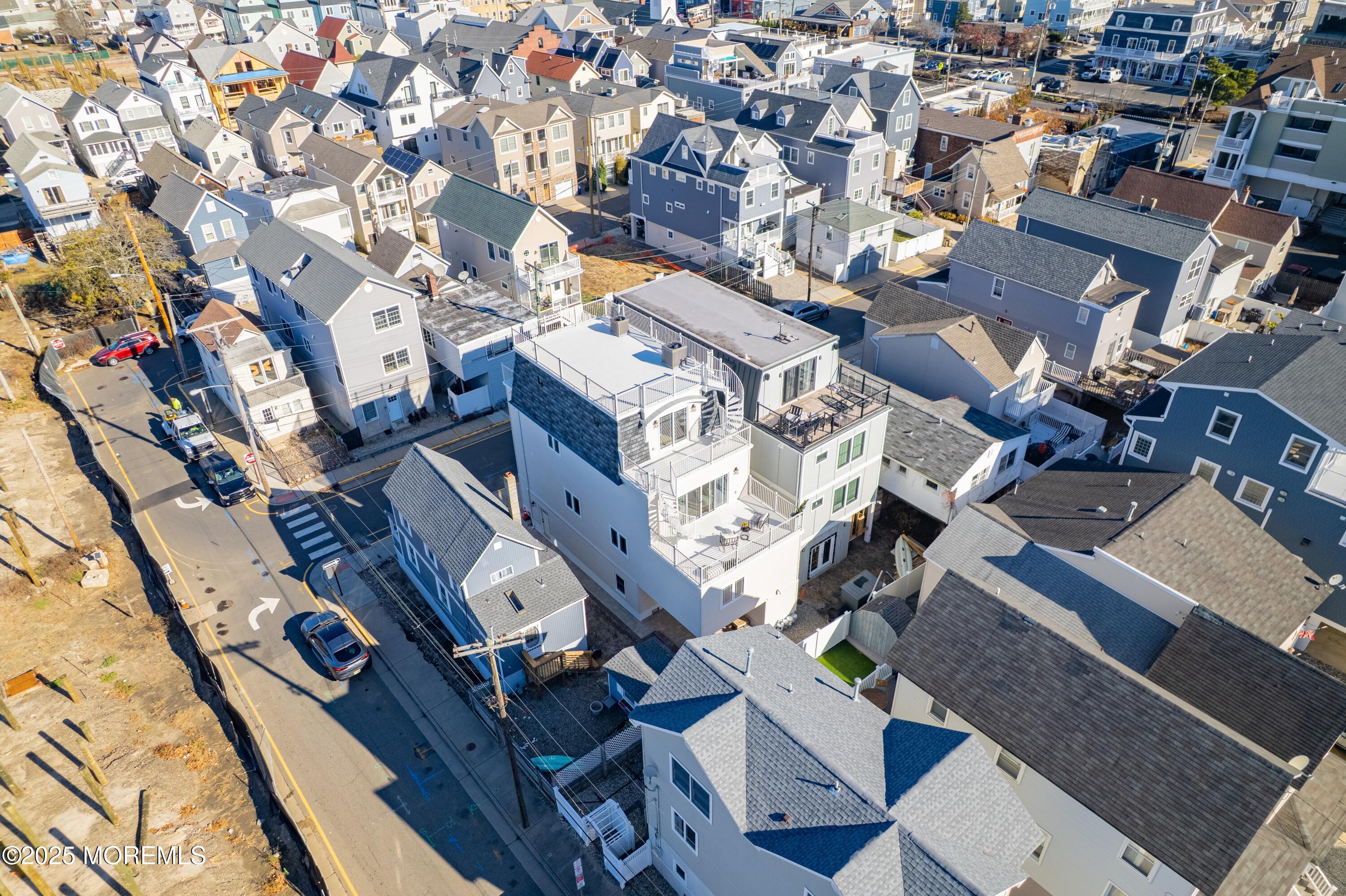 24 Surf Street Sea Bright, NJ 07760 - Photo 39 of 51 an aerial view of a city with lots of residential buildings