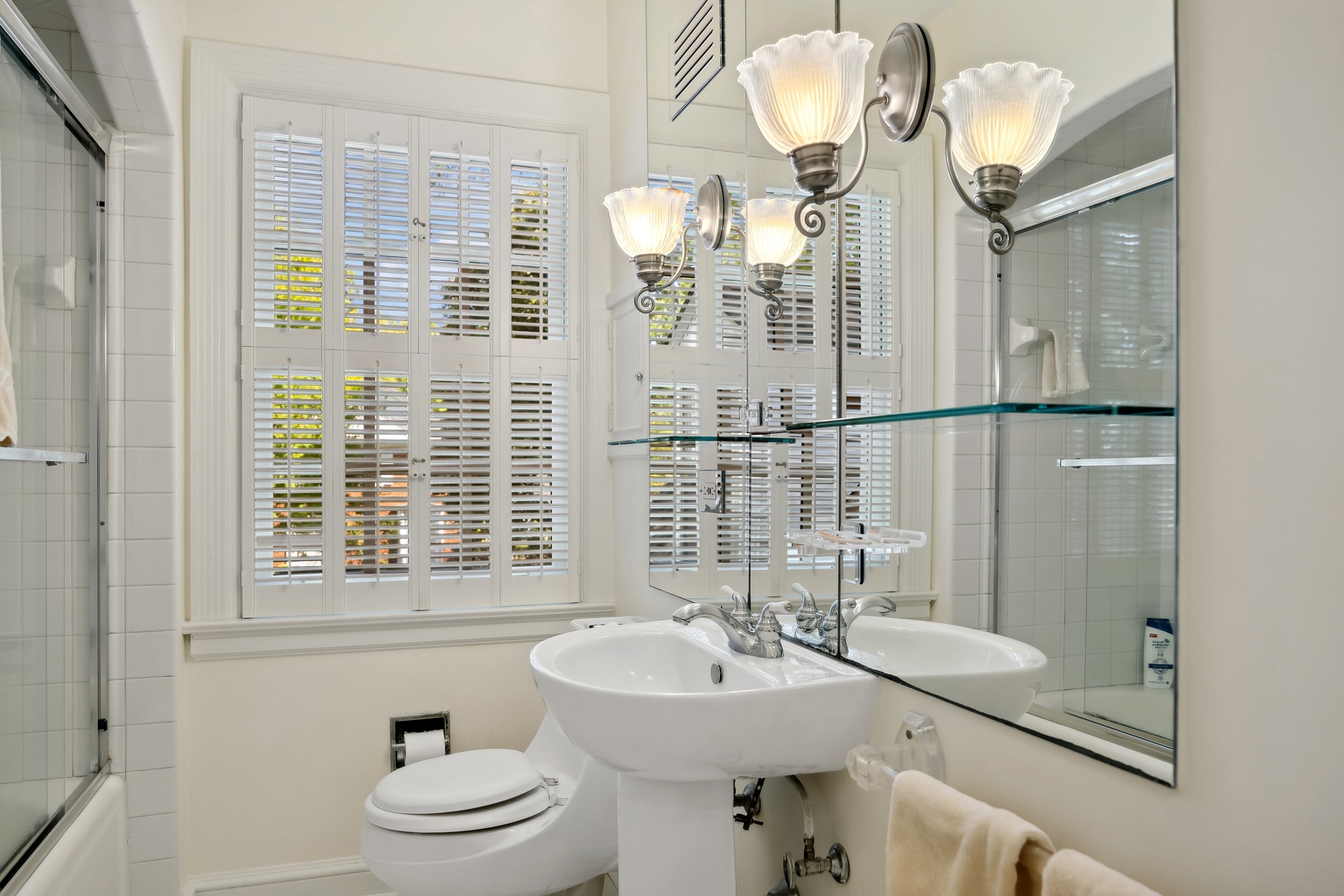 1035 Pawnee Road Wilmette, IL 60091 - Photo 19 of 26 a bathroom with a sink a toilet and shower