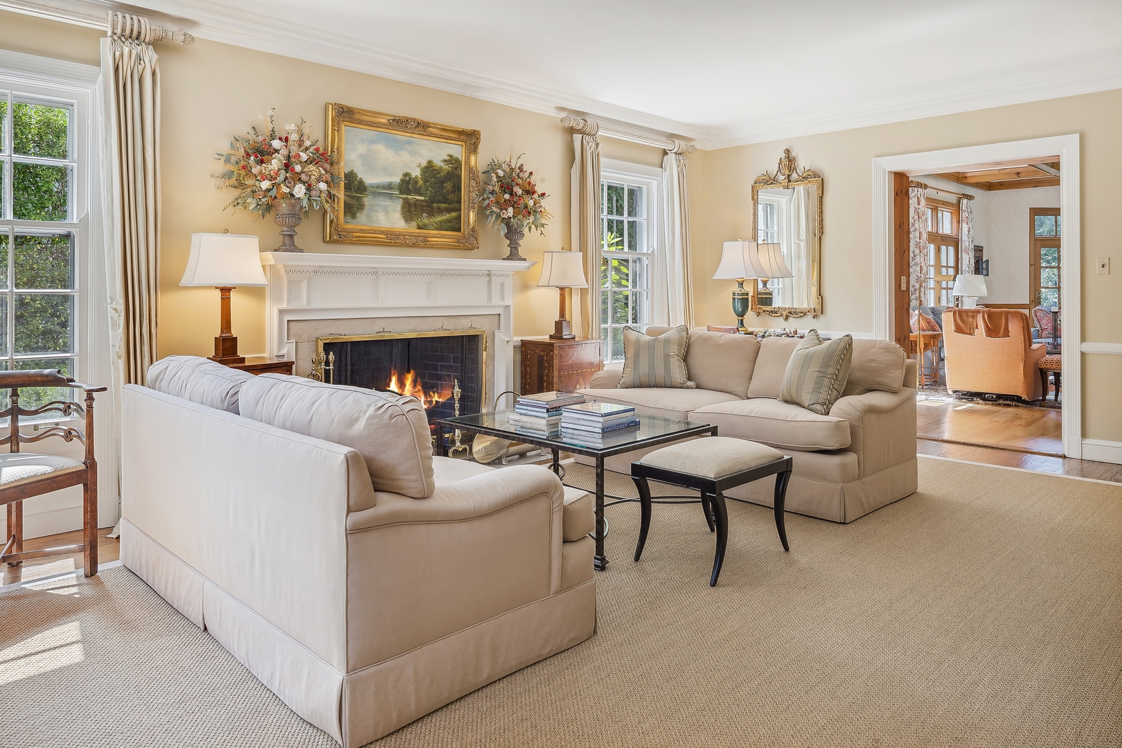 1035 Pawnee Road Wilmette, IL 60091 - Photo 4 of 26 a living room with furniture and a fireplace