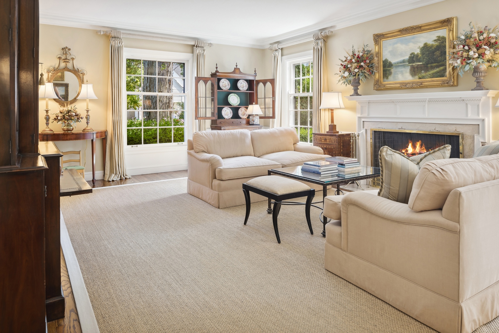 1035 Pawnee Road Wilmette, IL 60091 - Photo 5 of 26 a living room with furniture and a fireplace