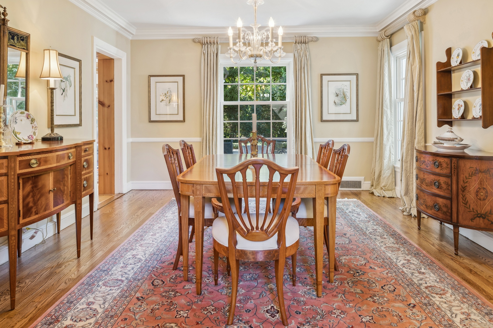 1035 Pawnee Road Wilmette, IL 60091 - Photo 9 of 26 a view of a dining room with furniture window and wooden floor