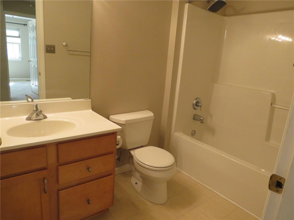 6755 Old Mars Crider Road Seven Fields, PA 16046 - Photo 26 of 50 a bathroom with a sink a toilet and shower