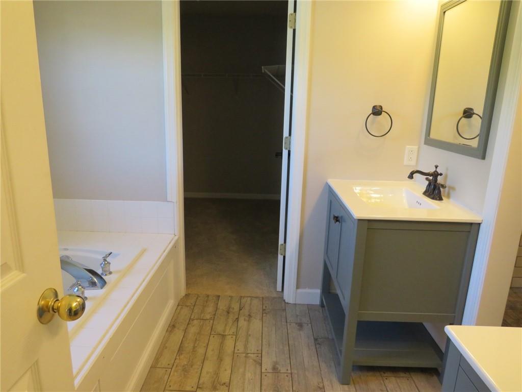 6755 Old Mars Crider Road Seven Fields, PA 16046 - Photo 36 of 50 a bathroom with a sink and a mirror