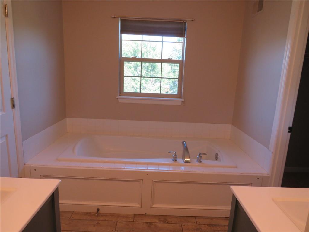 6755 Old Mars Crider Road Seven Fields, PA 16046 - Photo 38 of 50 a bathroom with a bathtub and a sink