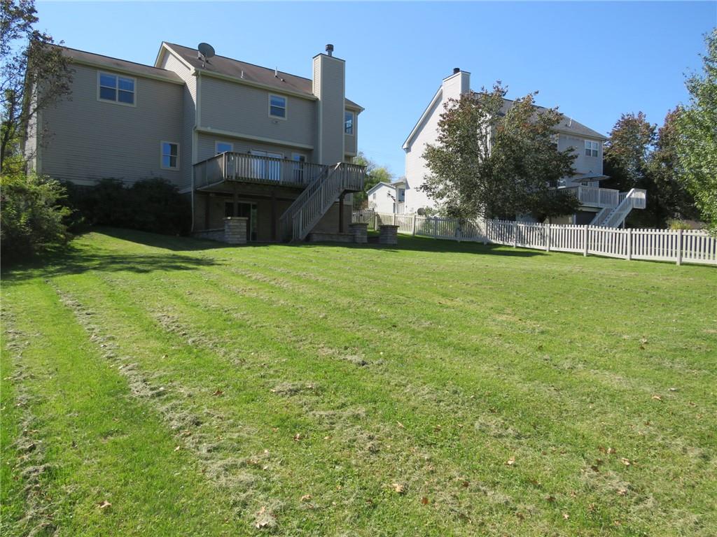 6755 Old Mars Crider Road Seven Fields, PA 16046 - Photo 49 of 50 a backyard of a house with lots of green space