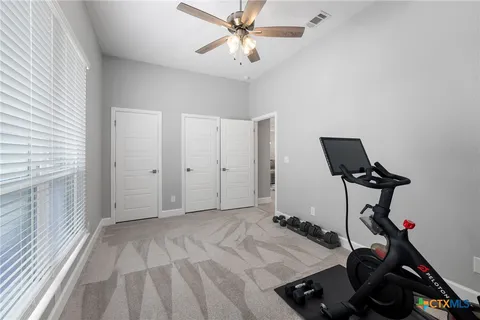 a view of a room with gym equipment