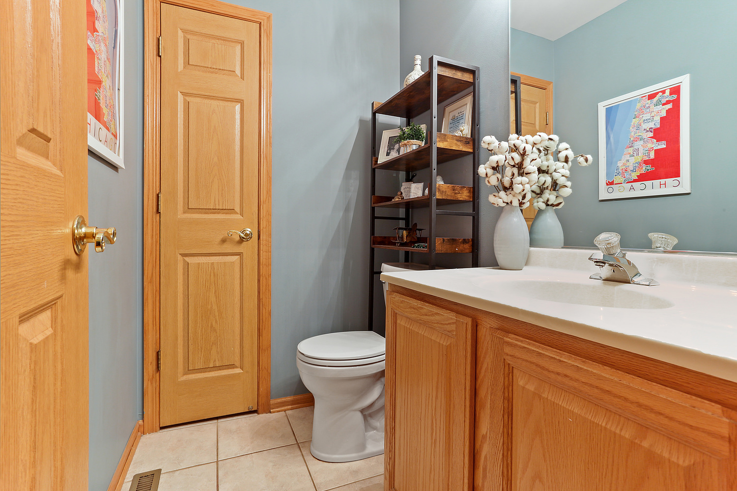 18133 Eagle Drive Tinley Park, IL 60477 - Photo 11 of 20 a bathroom with a sink a toilet and shower