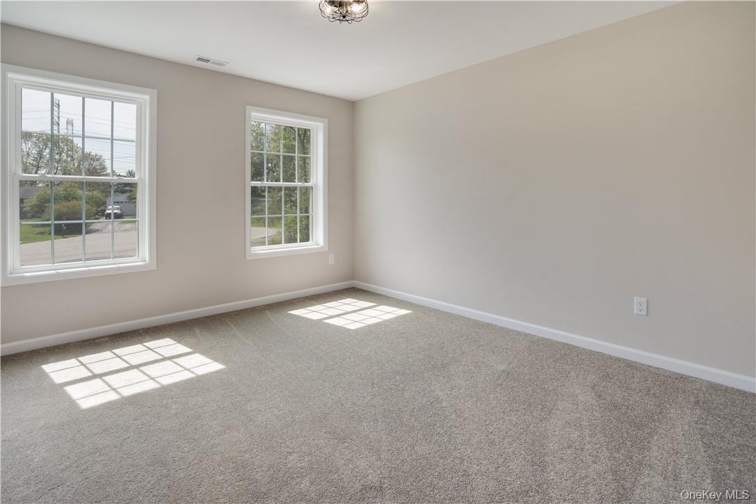 991 Freedom Road Pleasant Valley, NY 12569 - Photo 16 of 23 an empty room with windows