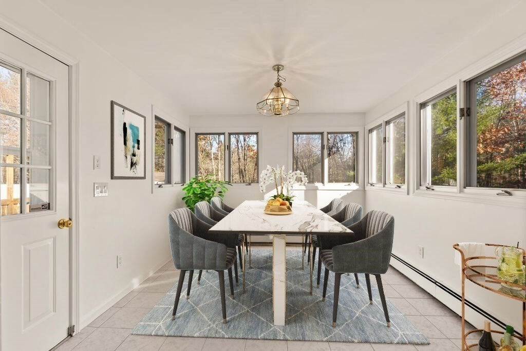 815 Great Road Stow, MA 01775 - Photo 15 of 32 a view of a dining room with furniture window and outside view