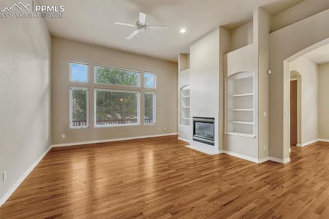 a view of a livingroom with wooden floor