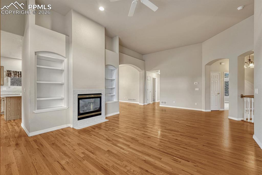 1665 Doe Run Point Colorado Springs, CO 80919 - Photo 7 of 49 a view of a livingroom with wooden floor