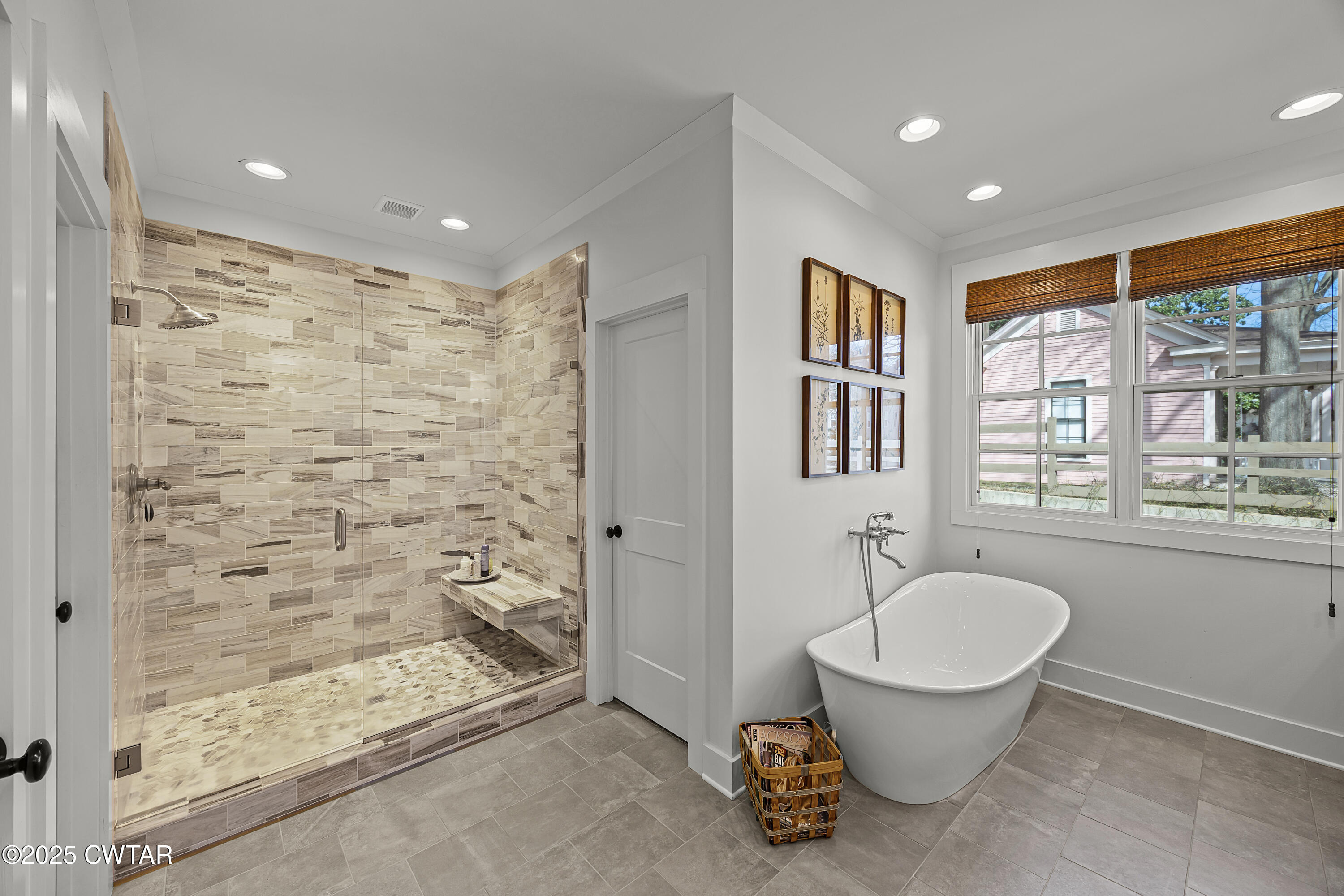 101 Morgan Street Jackson, TN 38301 - Photo 20 of 24 a bathroom with a granite countertop sink a toilet and shower