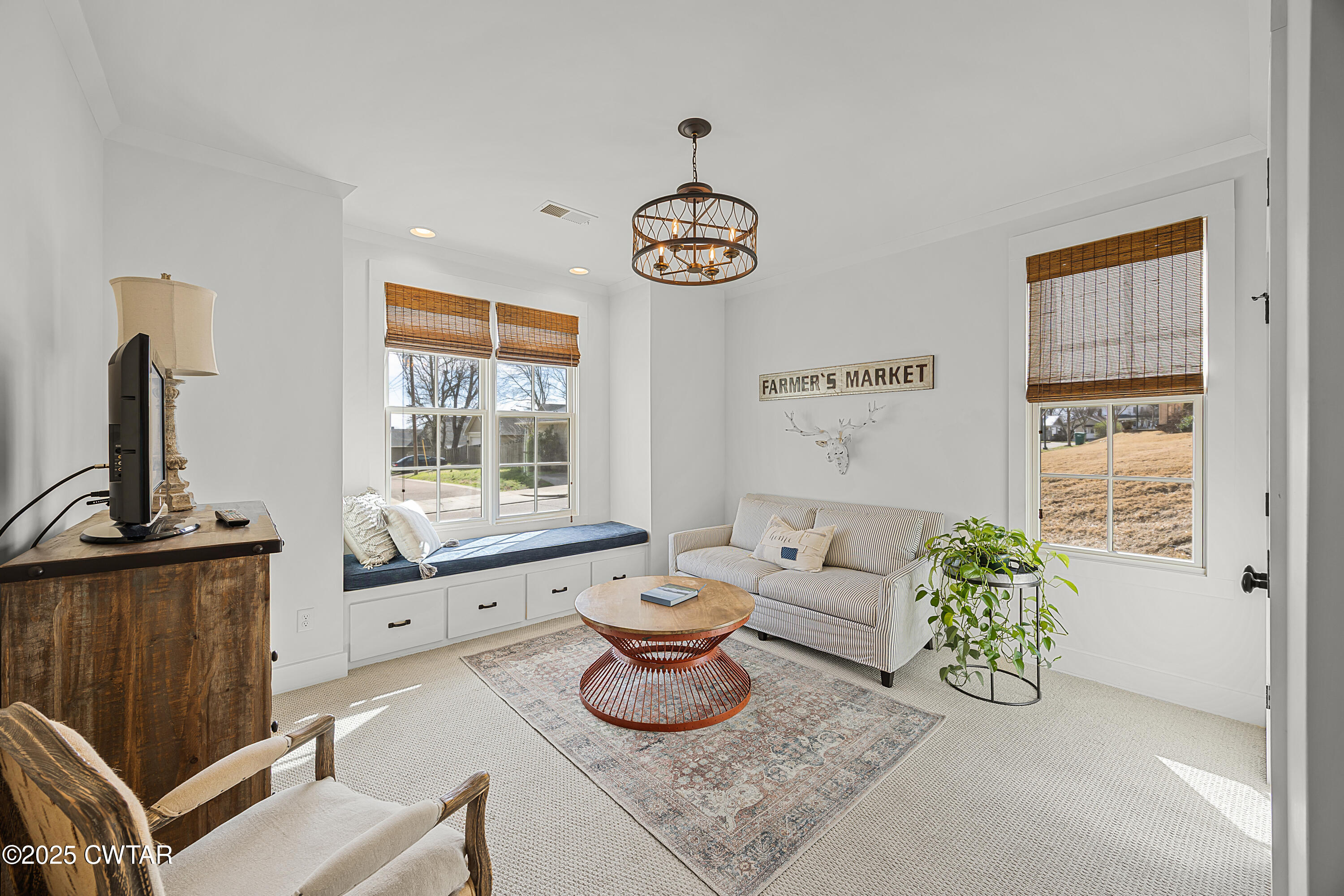 101 Morgan Street Jackson, TN 38301 - Photo 5 of 24 a living room with furniture and a window