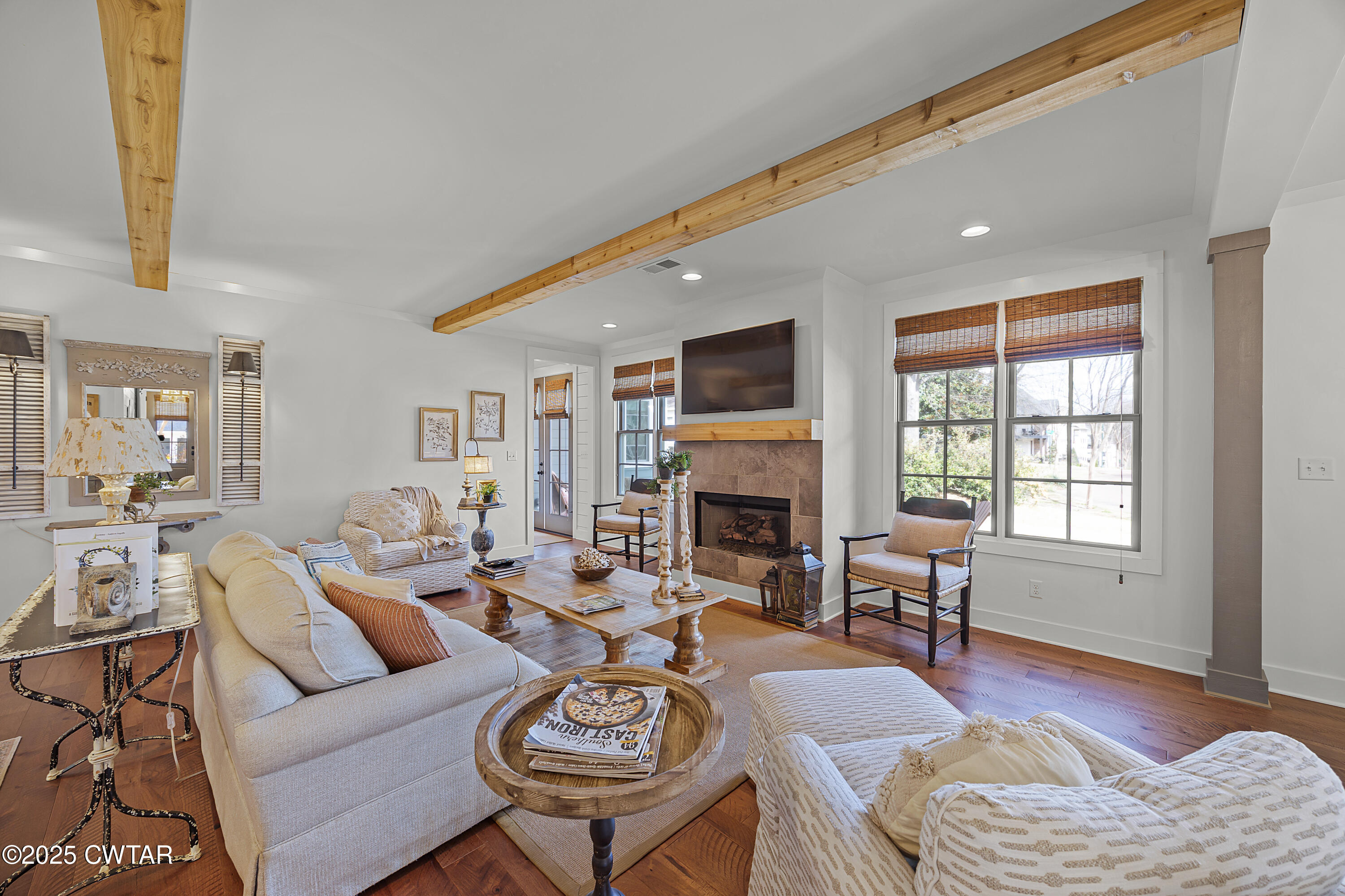 101 Morgan Street Jackson, TN 38301 - Photo 8 of 24 a living room with furniture fireplace and a table