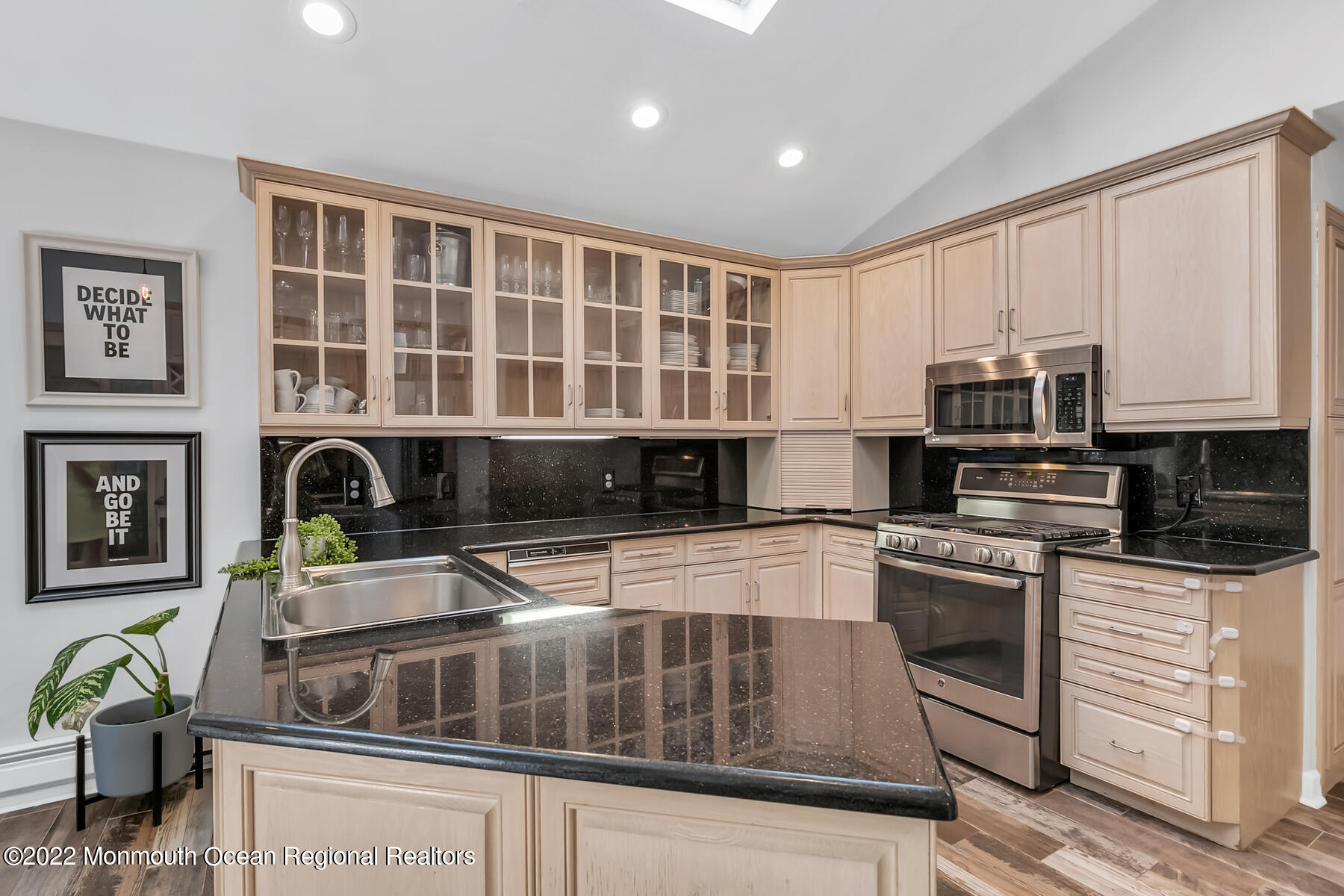 234 Red Hill Road Middletown, NJ 07748 - Photo 13 of 58 a kitchen with stainless steel appliances granite countertop a stove and a microwave