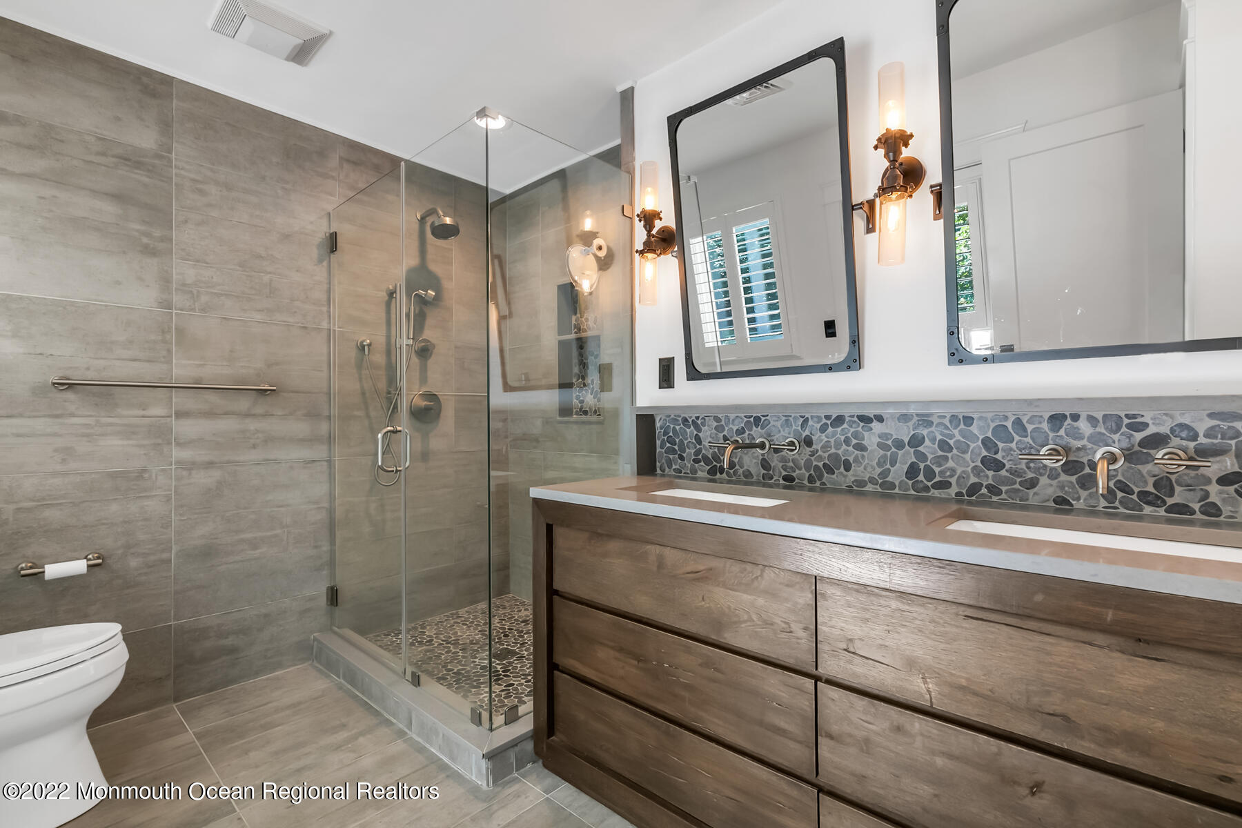234 Red Hill Road Middletown, NJ 07748 - Photo 16 of 58 a bathroom with a sink and mirror