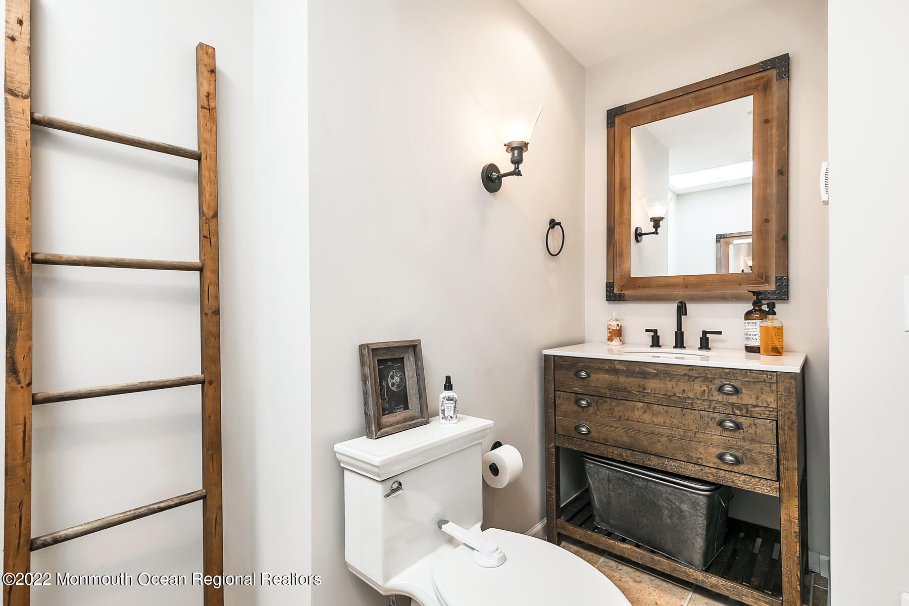234 Red Hill Road Middletown, NJ 07748 - Photo 23 of 58 a bathroom with a toilet sink and mirror