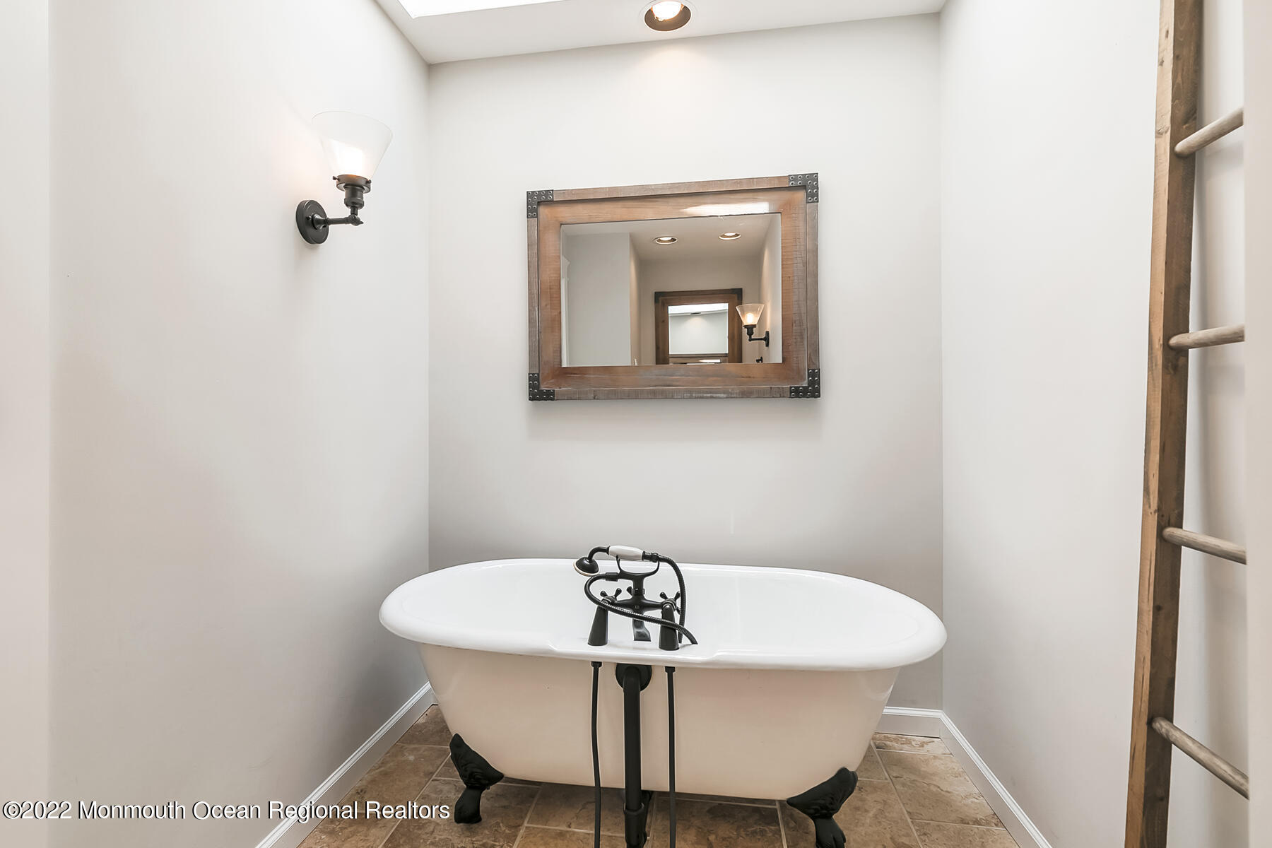 234 Red Hill Road Middletown, NJ 07748 - Photo 25 of 58 a view of a hallway with a table and chairs