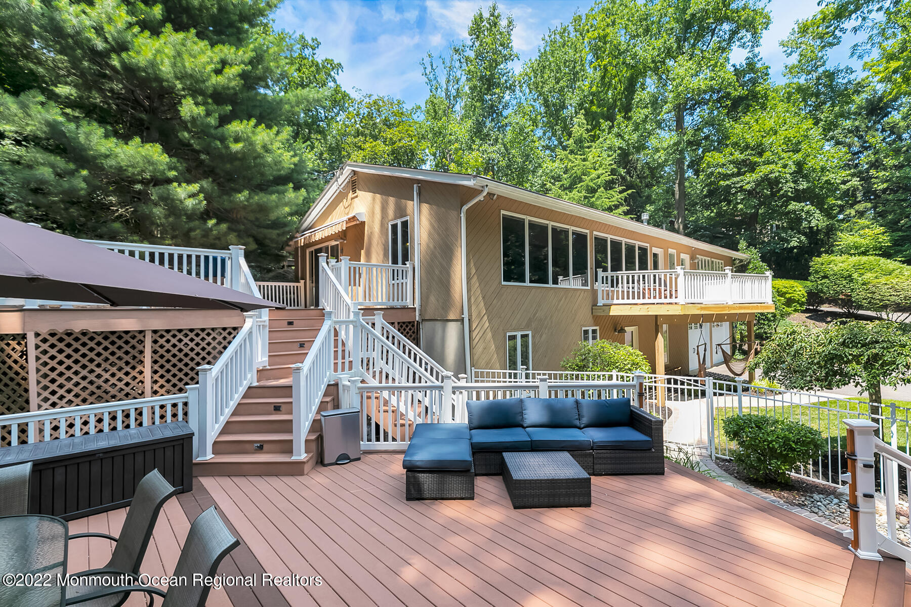 234 Red Hill Road Middletown, NJ 07748 - Photo 35 of 58 a view of house with yard outdoor seating and stairs