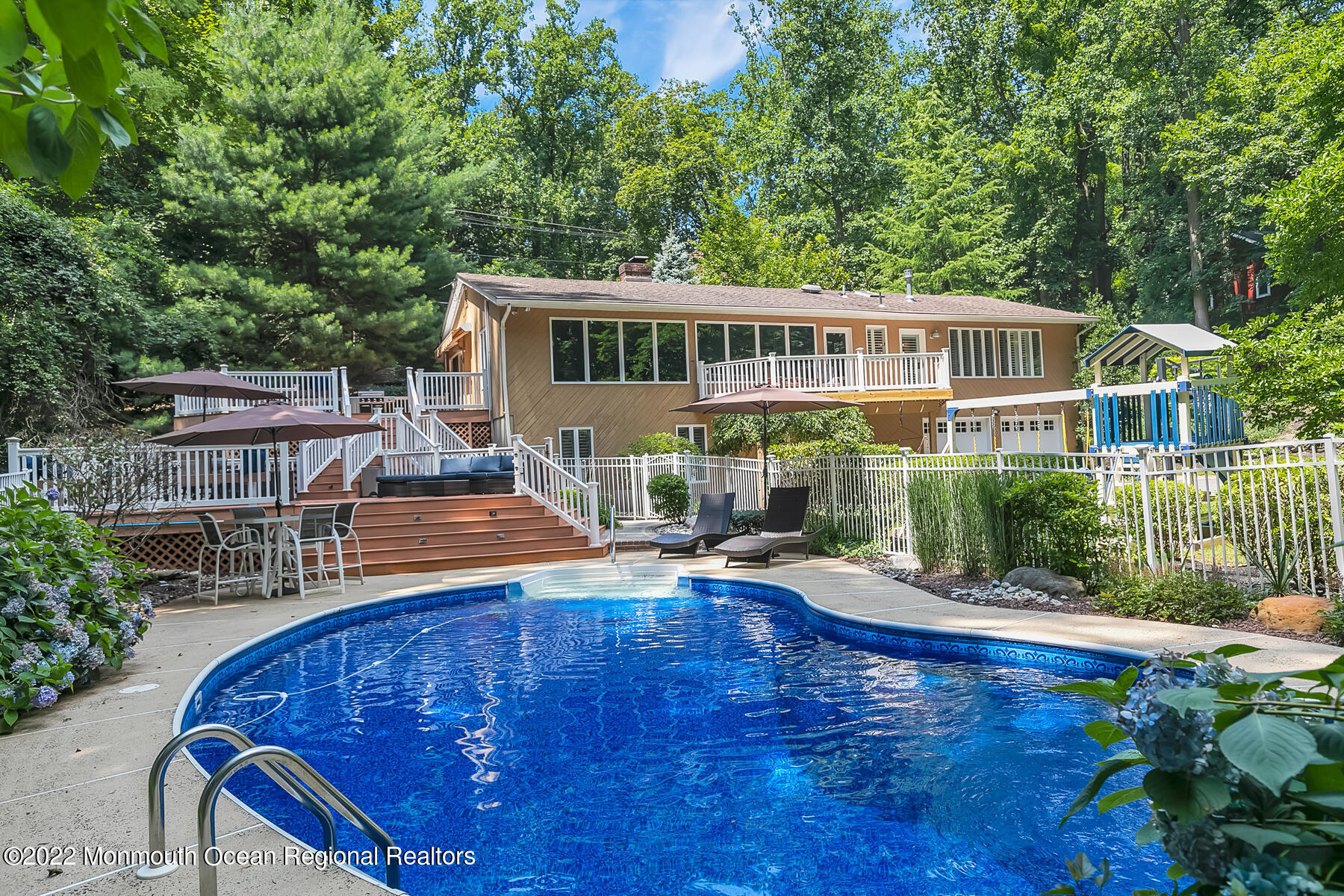 234 Red Hill Road Middletown, NJ 07748 - Photo 41 of 58 a view of a house with pool and sitting area