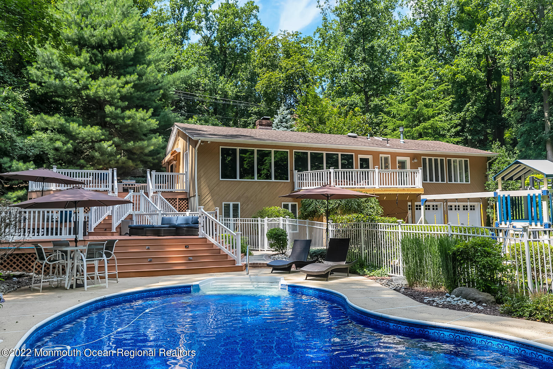 234 Red Hill Road Middletown, NJ 07748 - Photo 43 of 58 a front view of a house with a yard