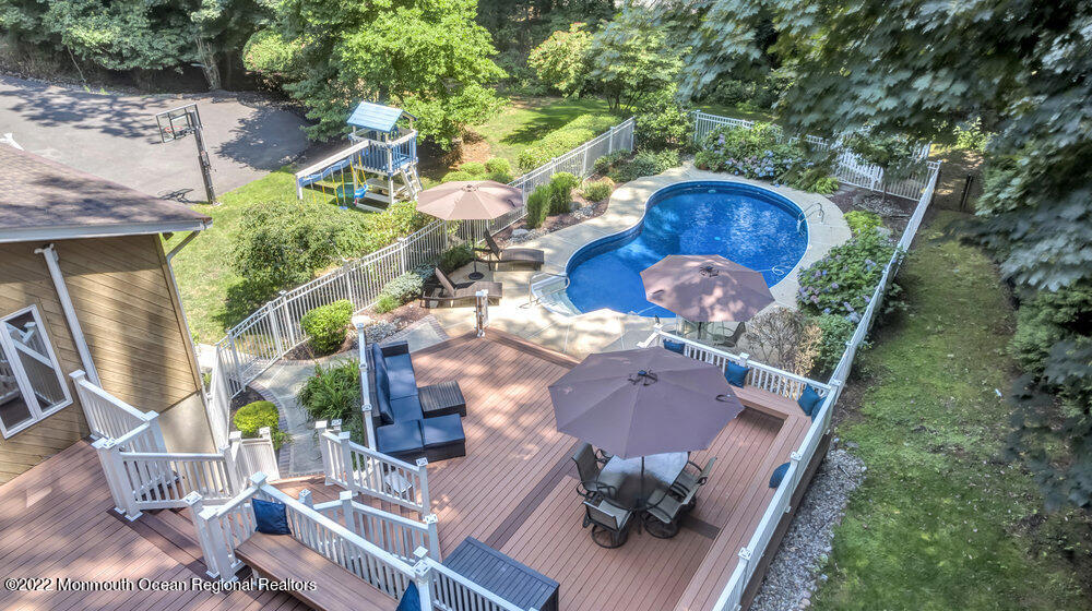 234 Red Hill Road Middletown, NJ 07748 - Photo 45 of 58 an aerial view of a house with a yard