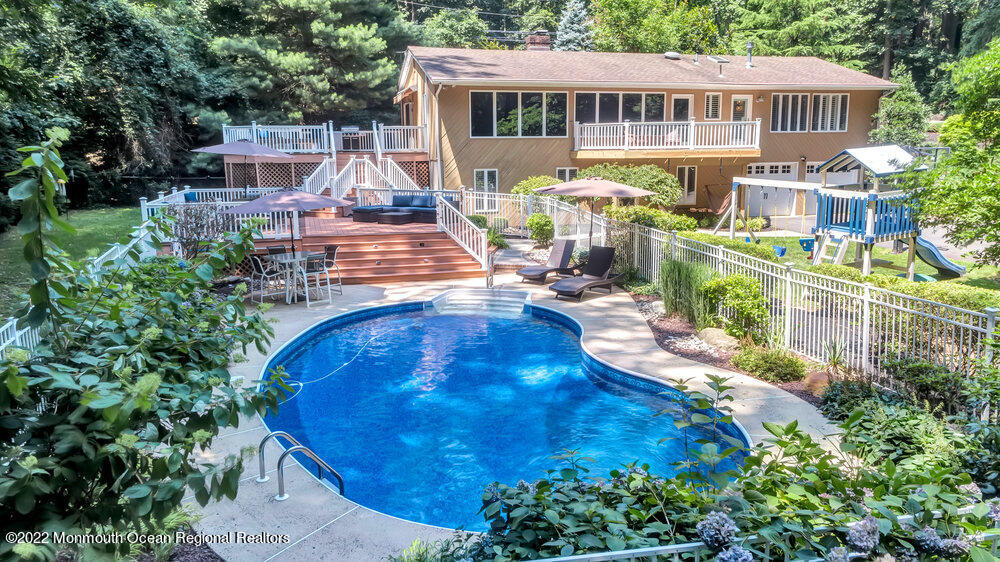 234 Red Hill Road Middletown, NJ 07748 - Photo 46 of 58 an aerial view of a house with swimming pool garden and patio