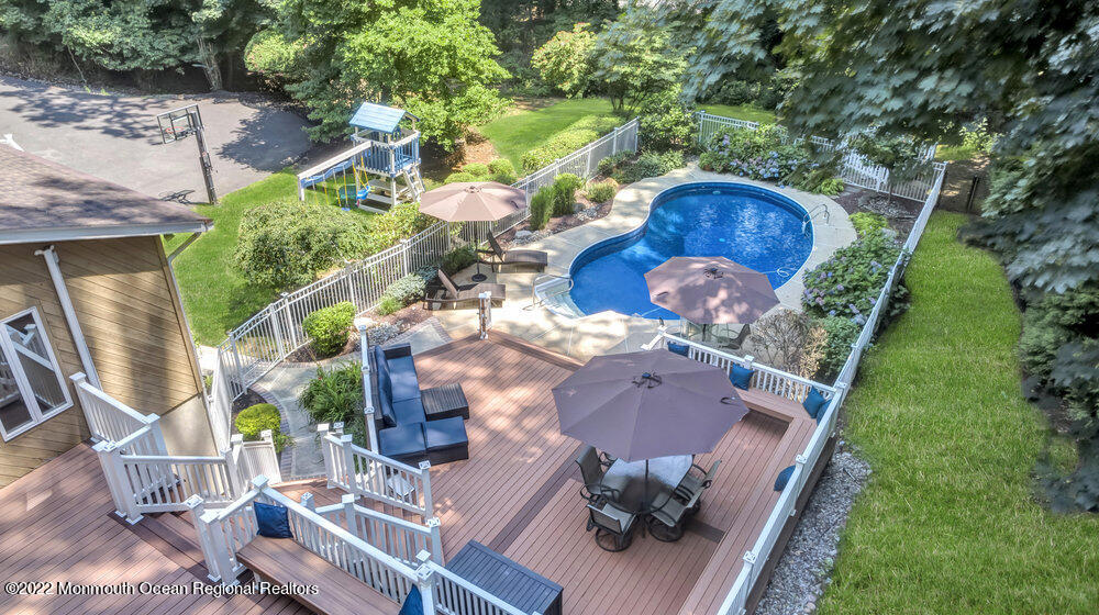 234 Red Hill Road Middletown, NJ 07748 - Photo 49 of 58 an aerial view of a house with garden space and street view