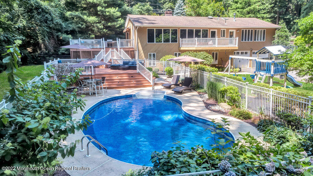 234 Red Hill Road Middletown, NJ 07748 - Photo 51 of 58 a view of a house with pool and sitting area