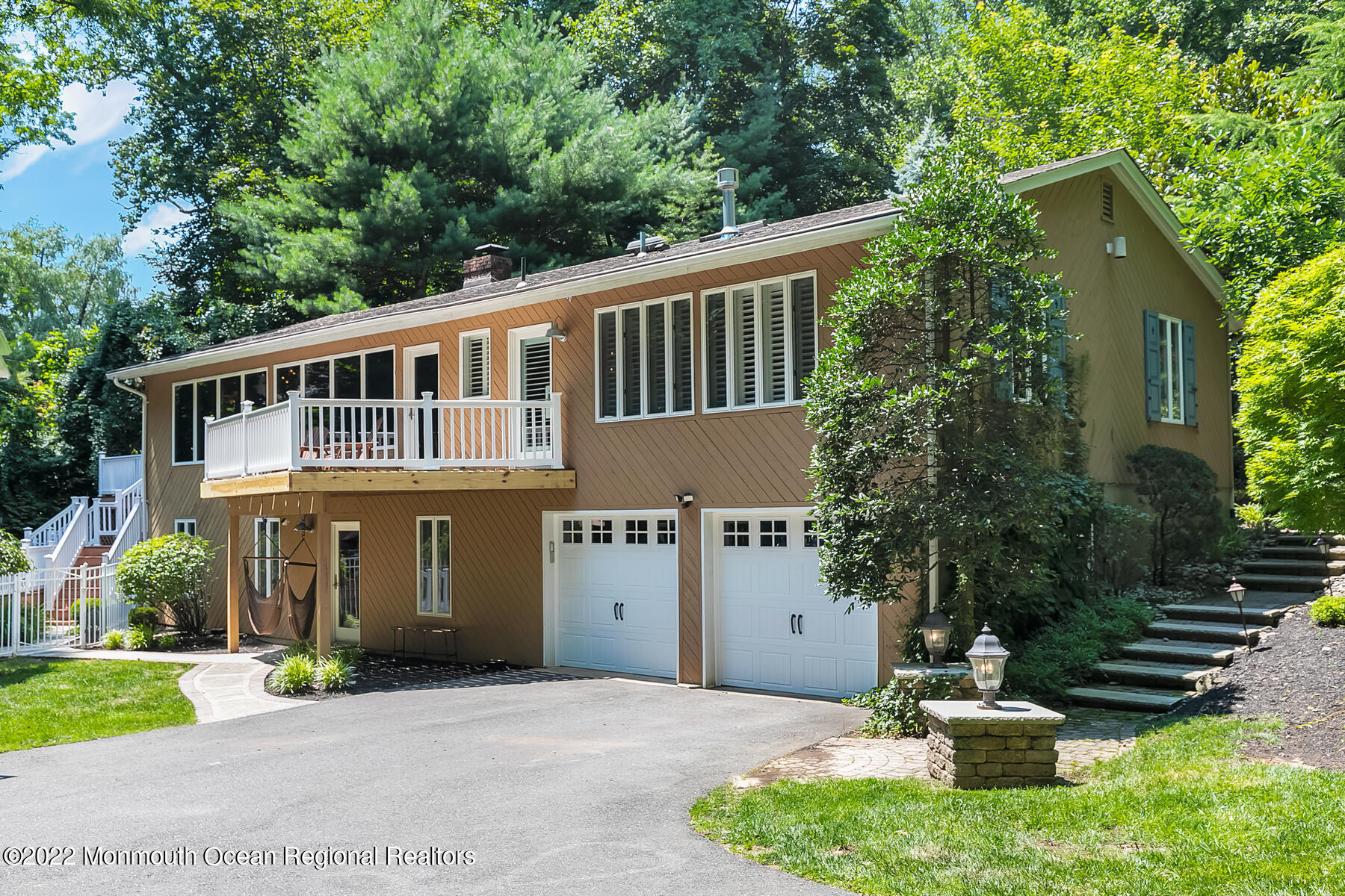 234 Red Hill Road Middletown, NJ 07748 - Photo 58 of 58 a front view of a house with a yard