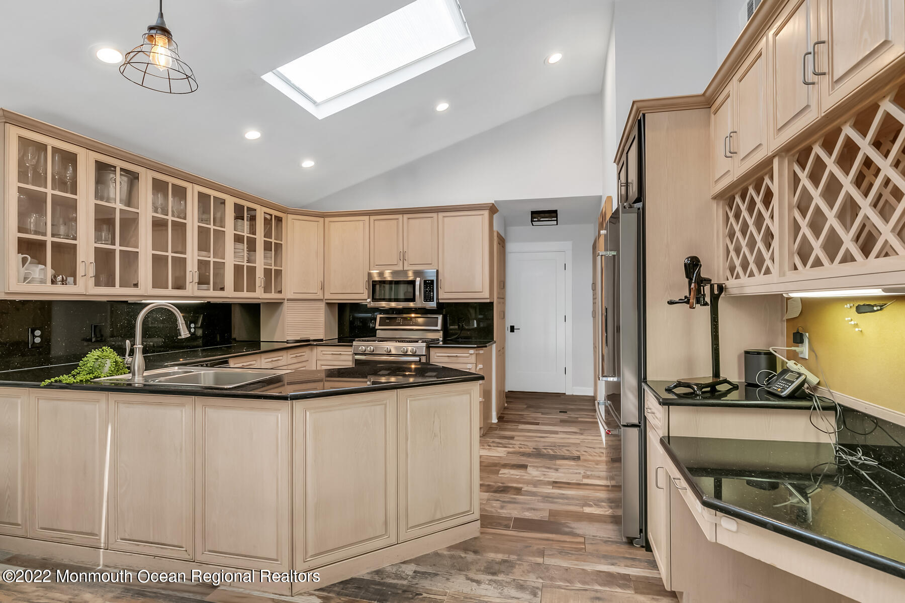 234 Red Hill Road Middletown, NJ 07748 - Photo 9 of 58 a kitchen with stainless steel appliances granite countertop a sink and a stove