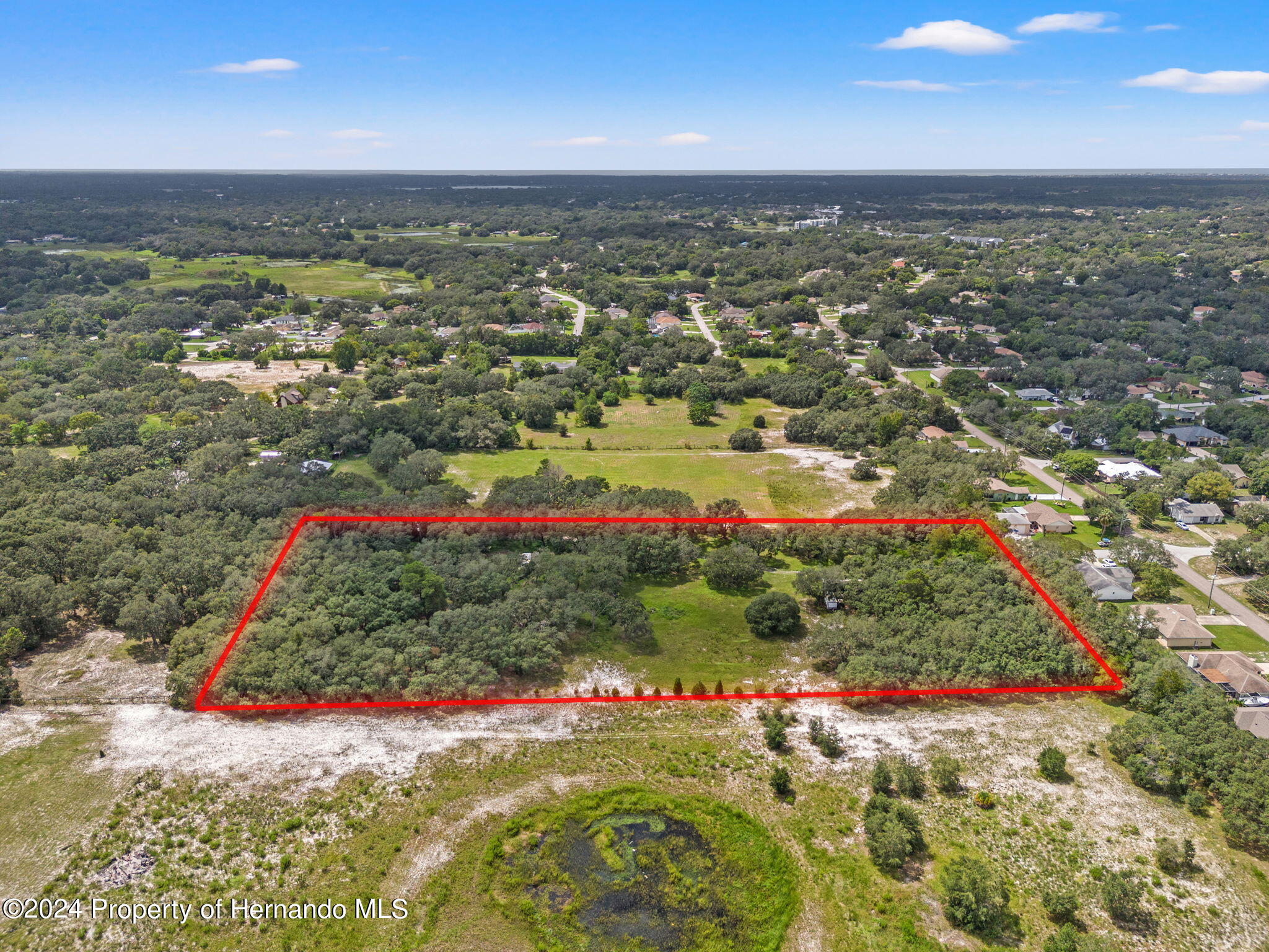 1088 Newcomb Avenue Spring Hill, FL 34608 - Photo 2 of 9 a view of a city