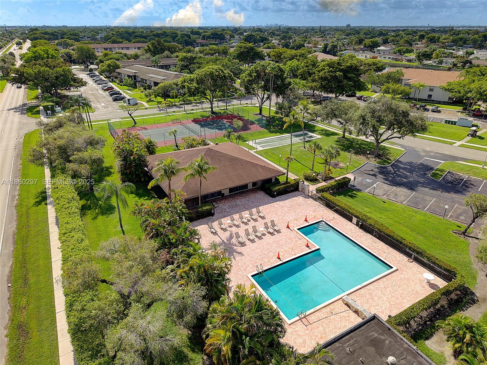 9606 West McNab Road, Unit 202 Tamarac, FL 33321 - Photo 27 of 29 an aerial view of a residential houses with outdoor space