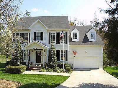 2901 Lothian Way Raleigh, NC 27612 - Photo 1 of 1 a front view of a house with a yard and garage