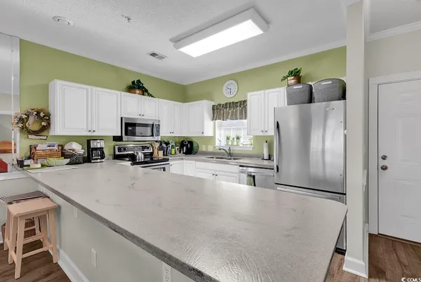 $239,500 | 4815 Orchid Way, Unit 104, Myrtle Beach, SC 29577