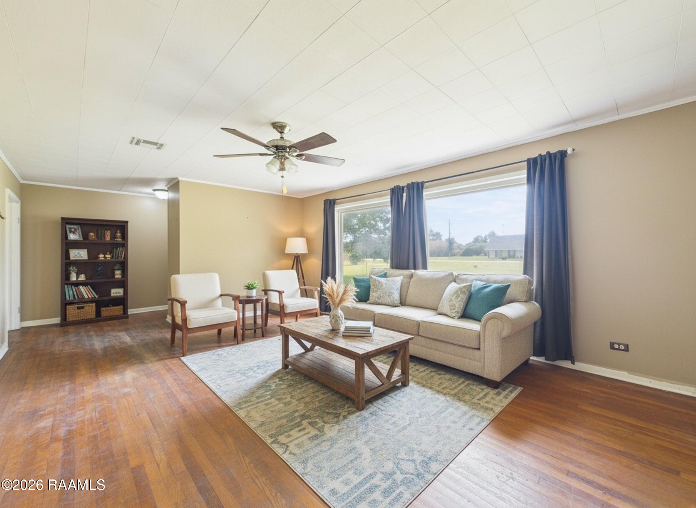2700 Captain Cade Road Broussard, LA 70518 - Photo 8 of 20 2700 Captain Cade_06 - INT - Living RM (