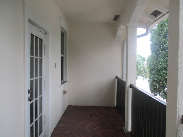1140 Northwest 18th Avenue Boca Raton, FL 33431 - Photo 11 of 18 a view of entryway with window and wooden floor