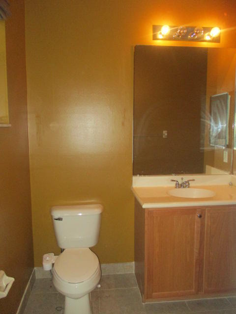 1140 Northwest 18th Avenue Boca Raton, FL 33431 - Photo 12 of 18 a bathroom with a sink and a toilet