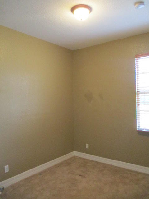 1140 Northwest 18th Avenue Boca Raton, FL 33431 - Photo 16 of 18 an empty room with a window