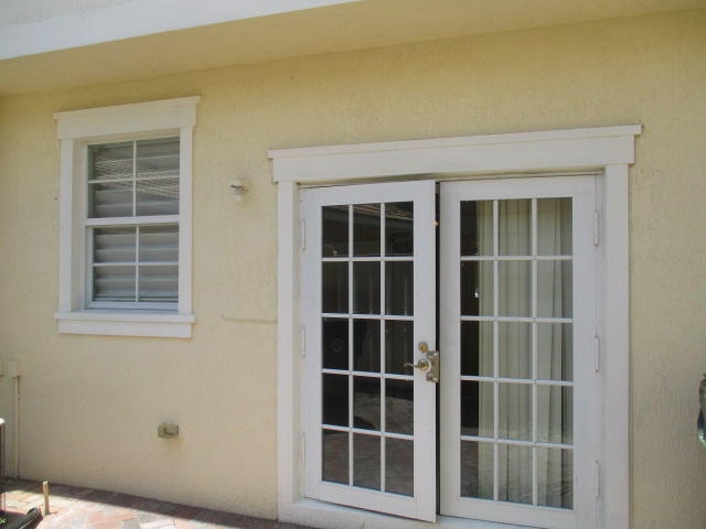 1140 Northwest 18th Avenue Boca Raton, FL 33431 - Photo 3 of 18 a view of front door