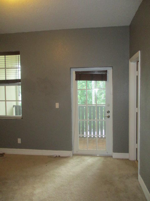 1140 Northwest 18th Avenue Boca Raton, FL 33431 - Photo 10 of 18 an empty room with windows