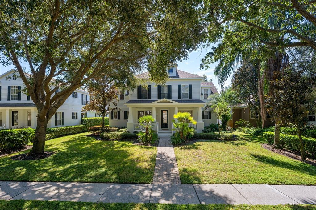 11905 Camden Park Drive Windermere, FL 34786 - Photo 1 of 32 a front view of a house with a yard